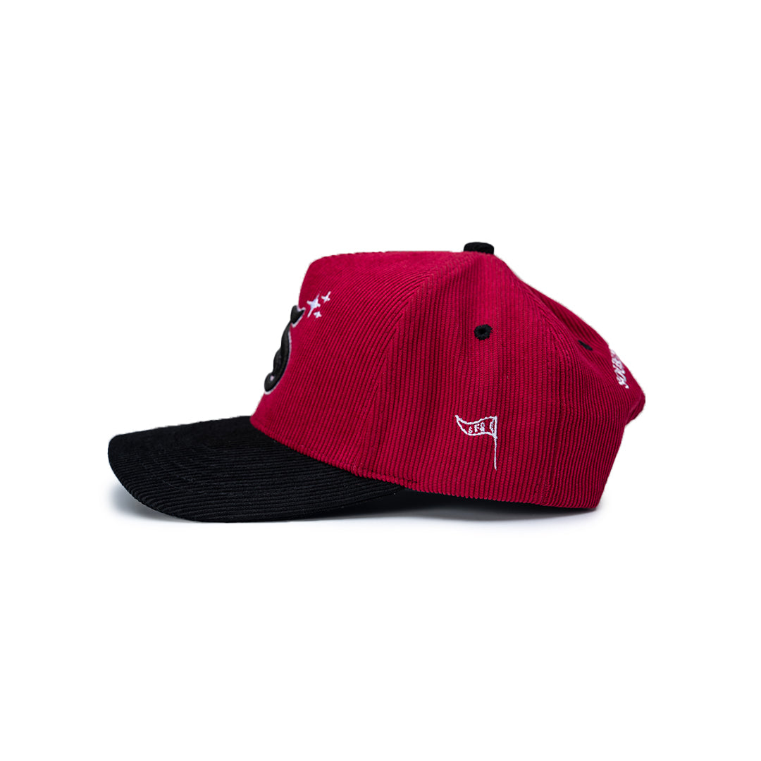 Red and black cap with a logo on a white background