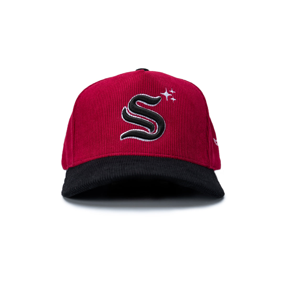 Red and black cap with a logo on a white background