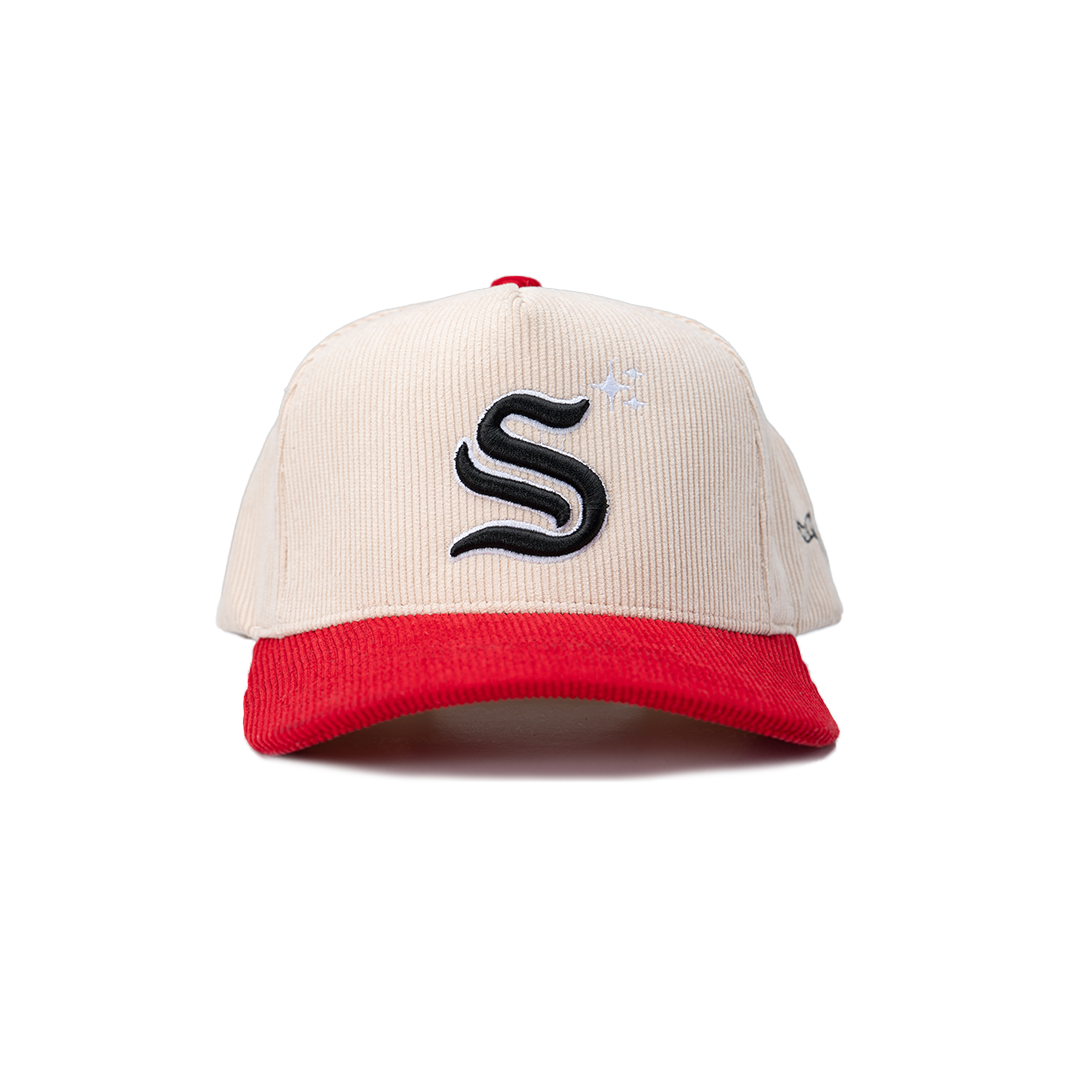 Beige and red cap with a black logo on a white background