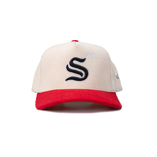 Beige and red cap with a black logo on a white background